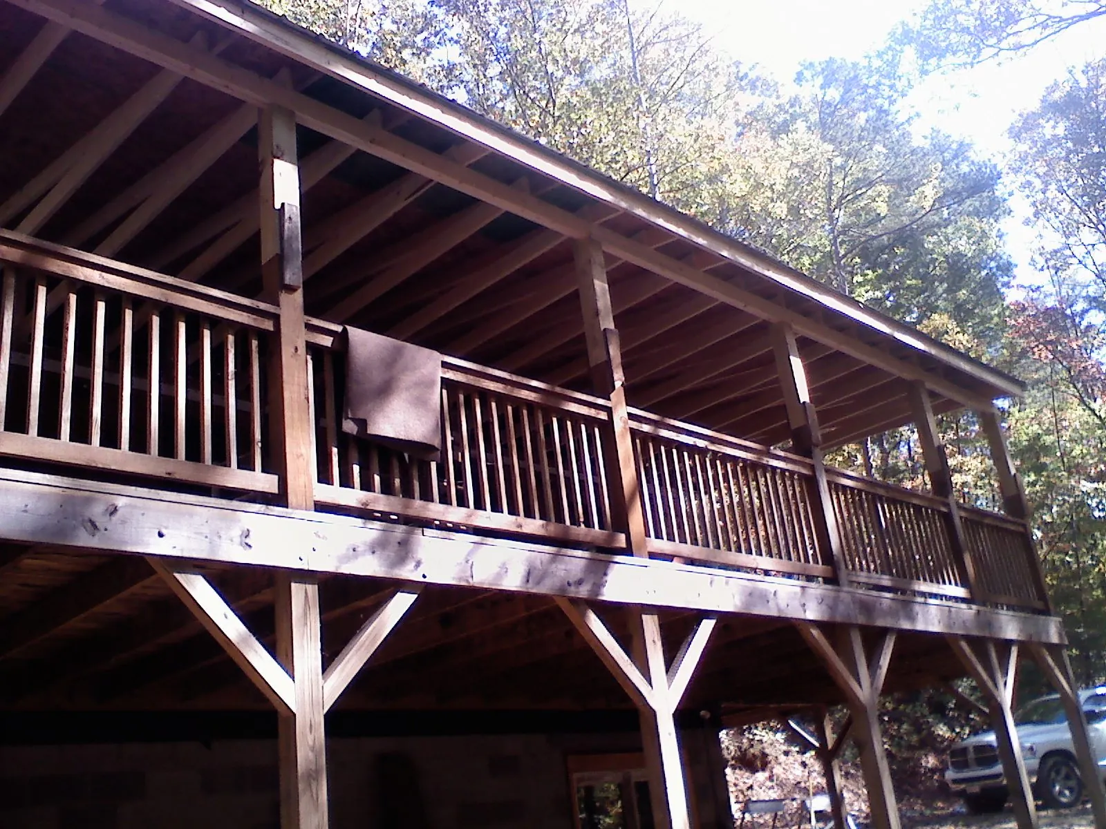 Timber framing under a new elevated porch and deck — Roof Leak Repair in Belle Center by Roofing Brothers